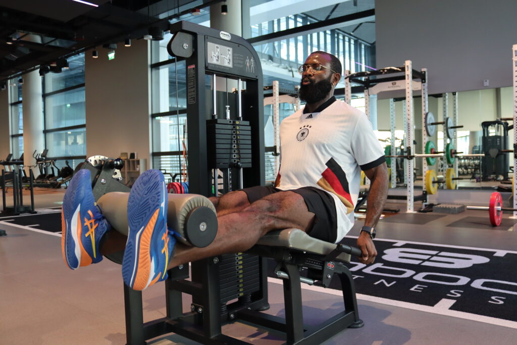 Raymond doing leg extension exercise